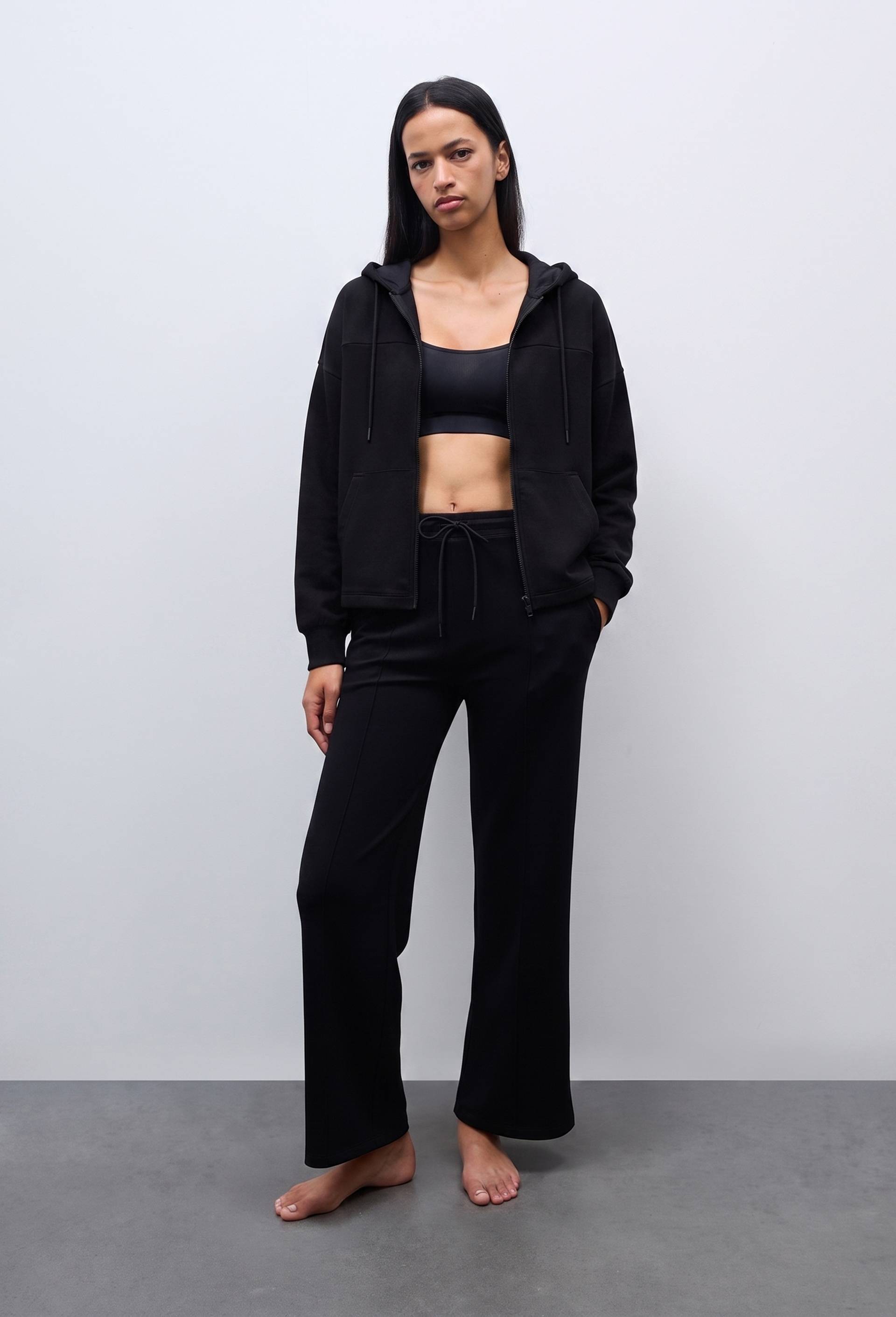 Pantalon de sport uni en molleton technique, Noir, swatch image